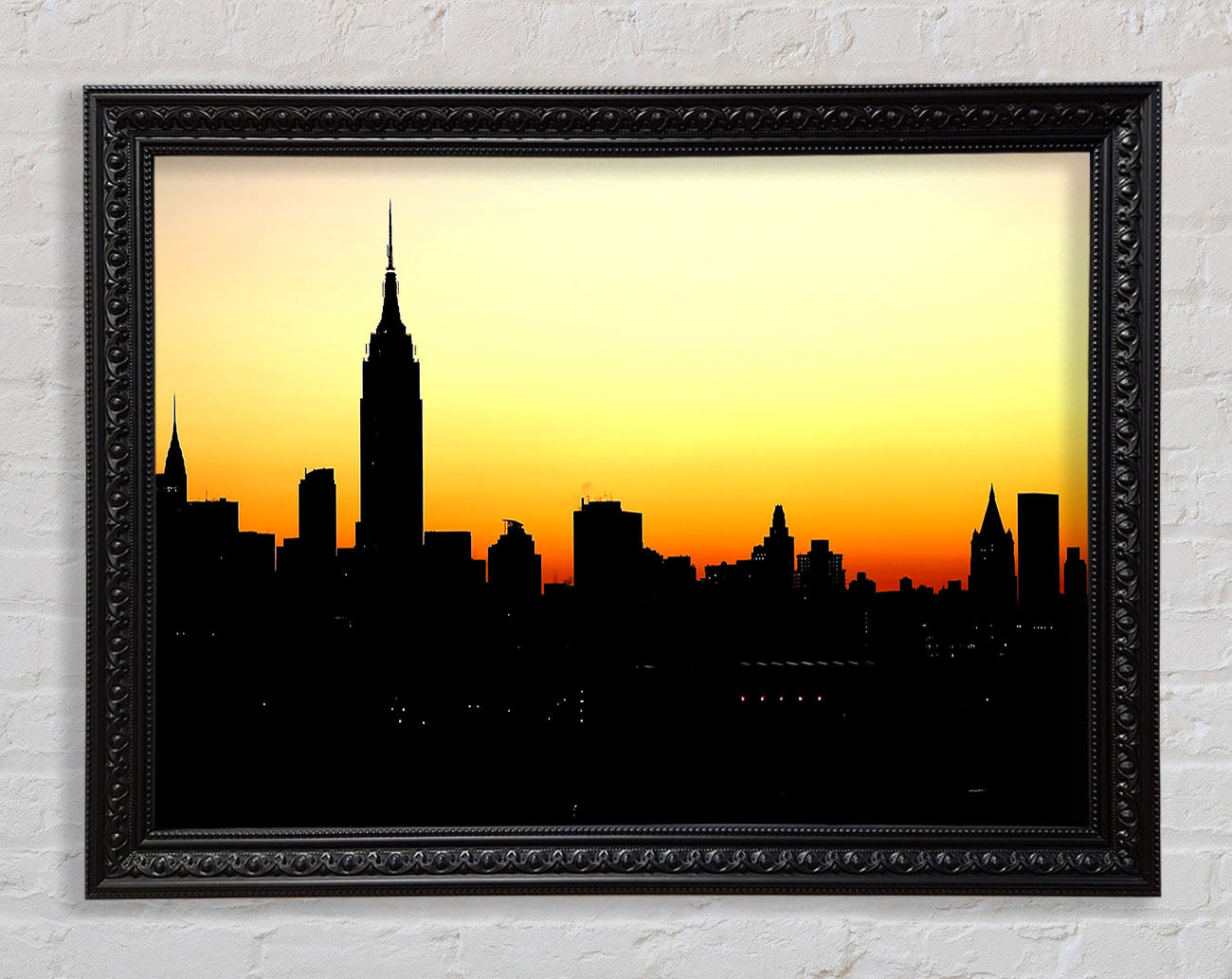 Empire State Building NYC At Sunset Framed Print