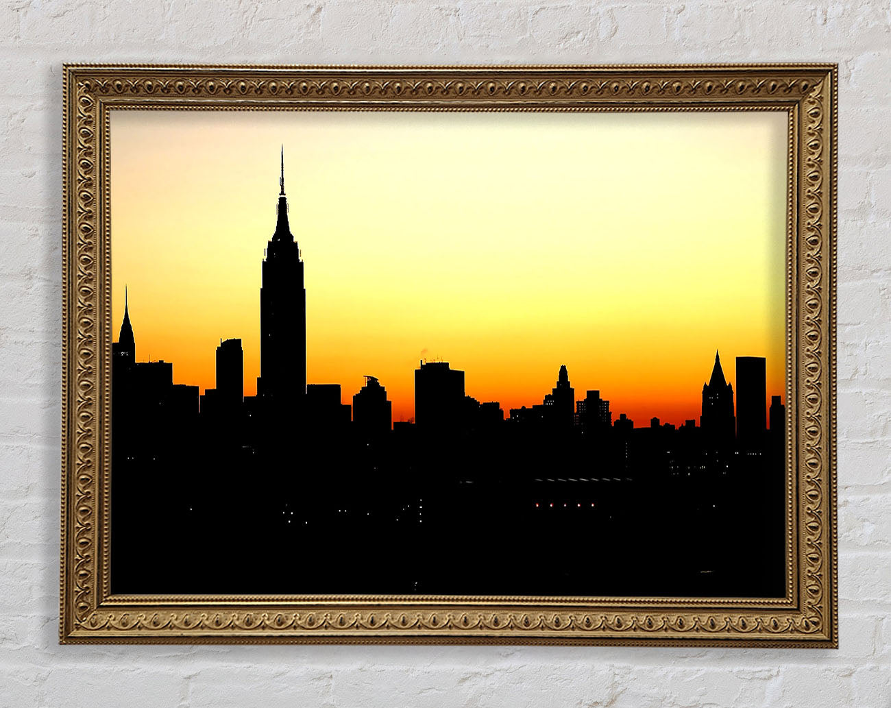 Empire State Building NYC At Sunset Framed Print
