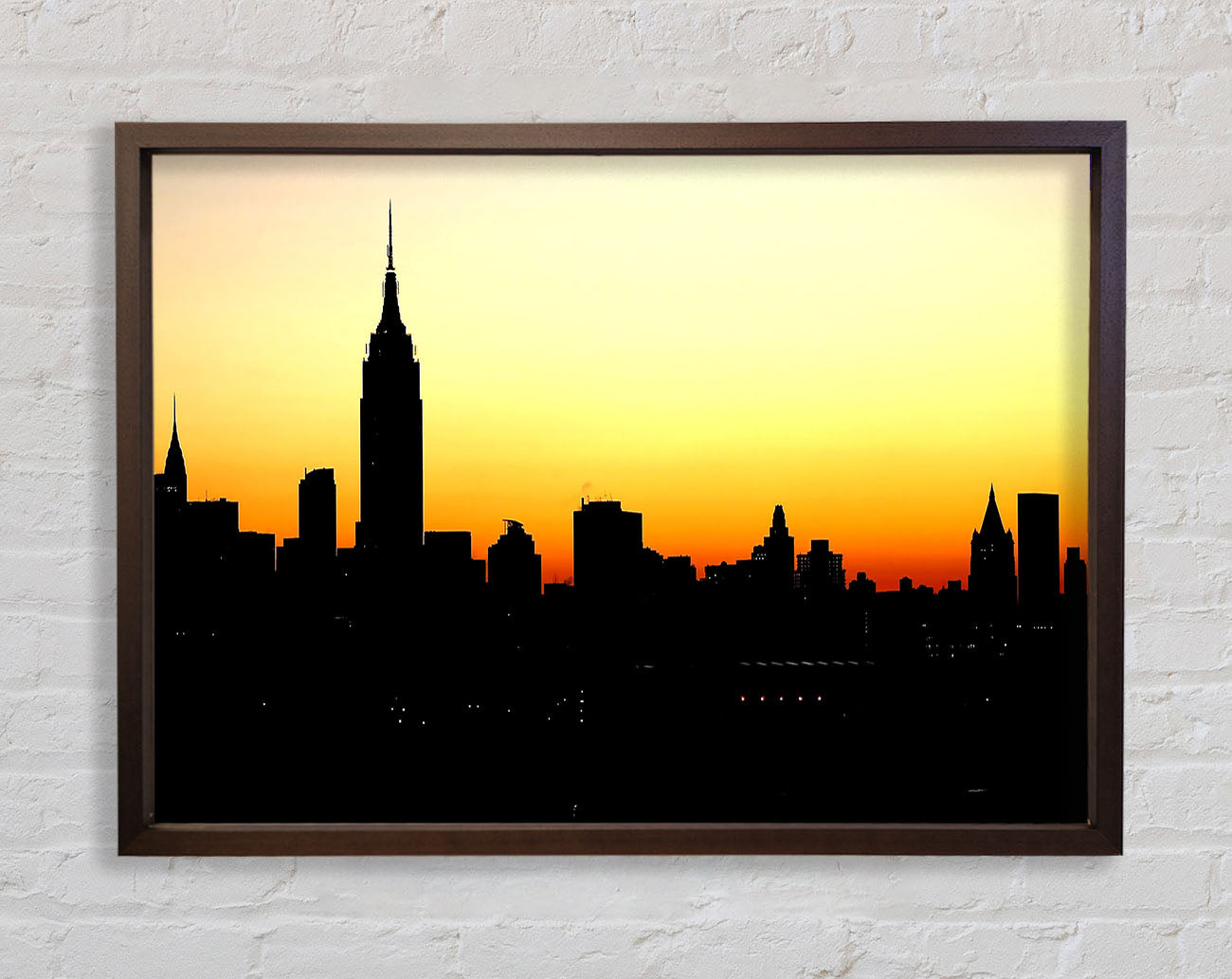 Empire State Building NYC At Sunset Framed Print
