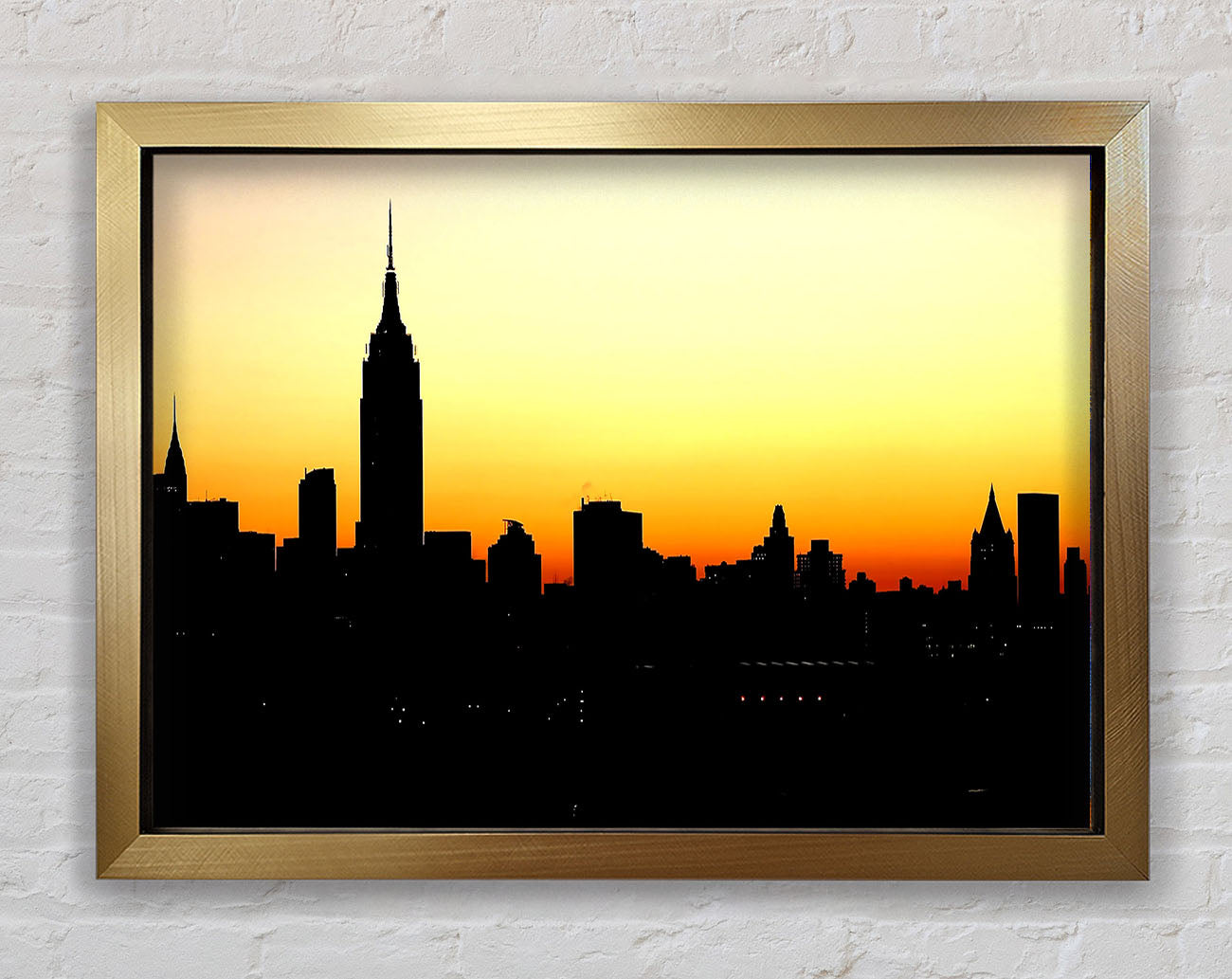 Empire State Building NYC At Sunset Framed Print