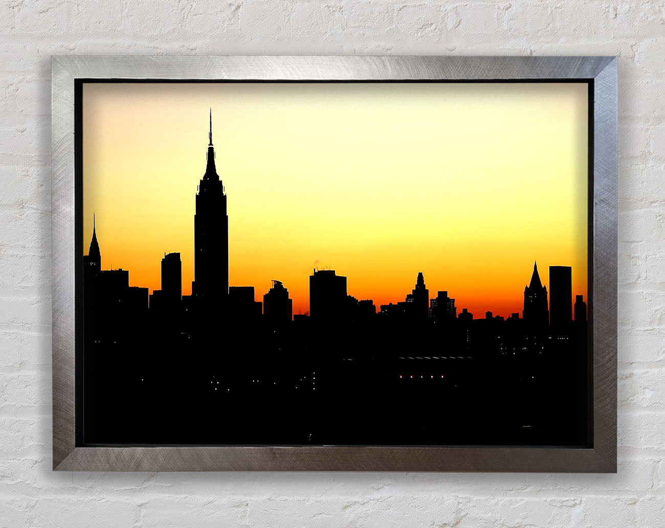 Empire State Building NYC At Sunset Framed Print