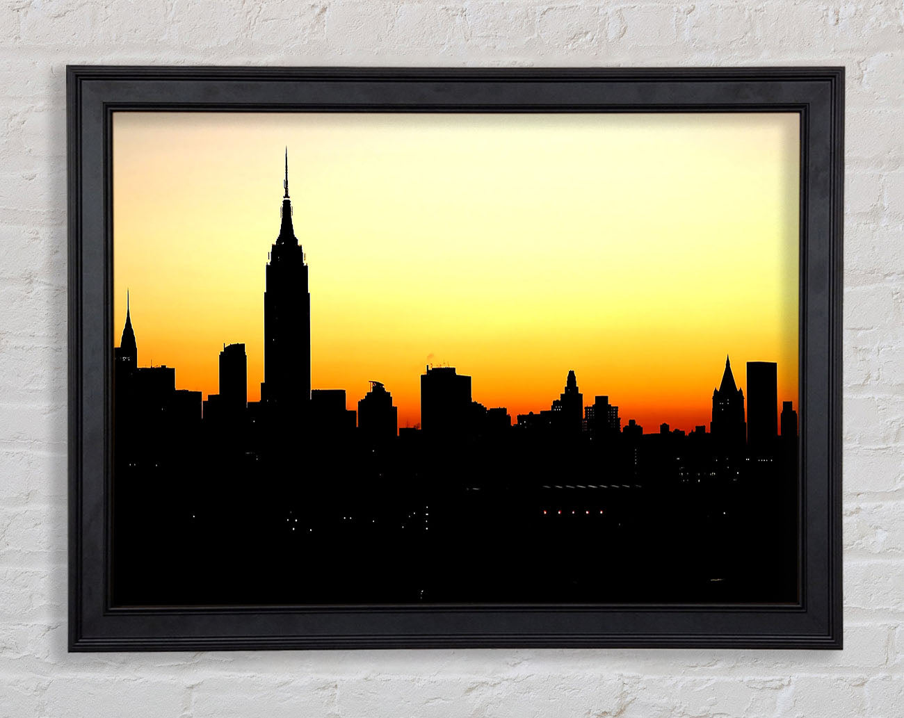 Empire State Building NYC At Sunset Framed Print