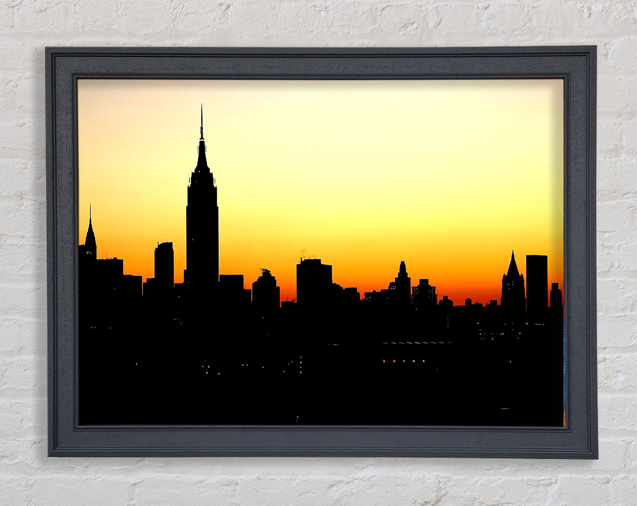 Empire State Building NYC At Sunset Framed Print