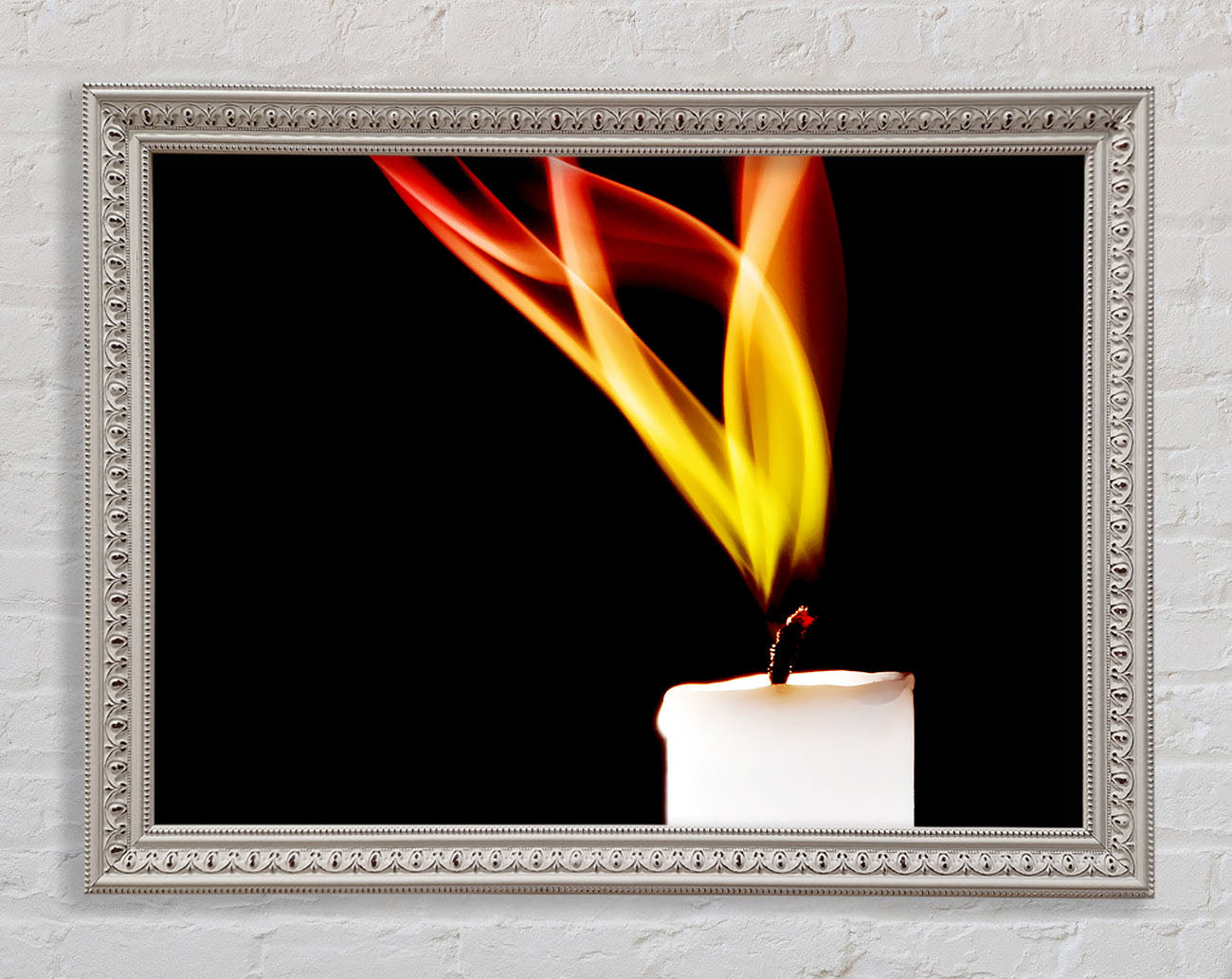 Flame Of A Candle Framed Print