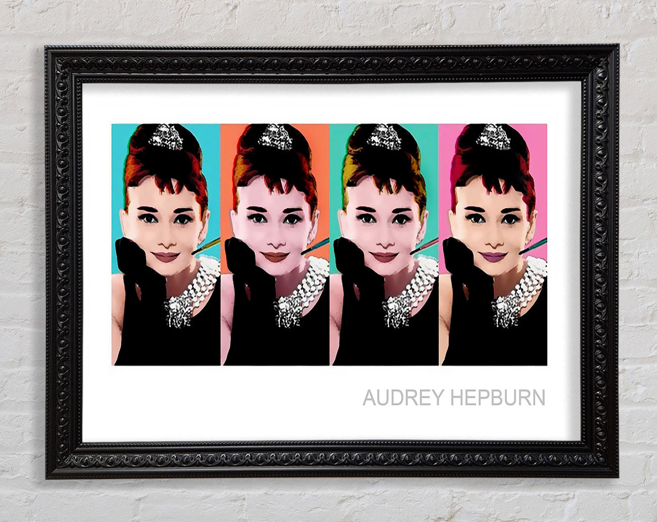 Audrey Hepburn 4 Faces Framed Print