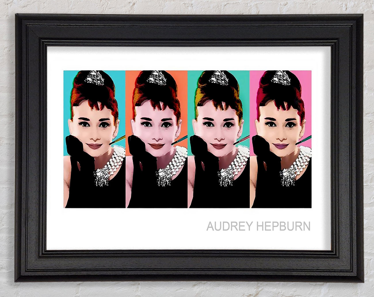 Audrey Hepburn 4 Faces Framed Print