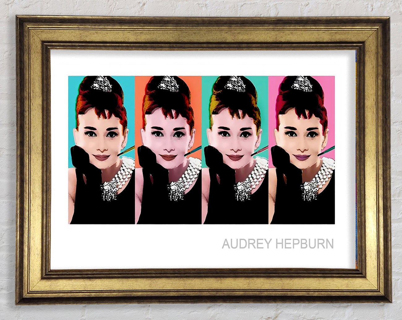 Audrey Hepburn 4 Faces Framed Print
