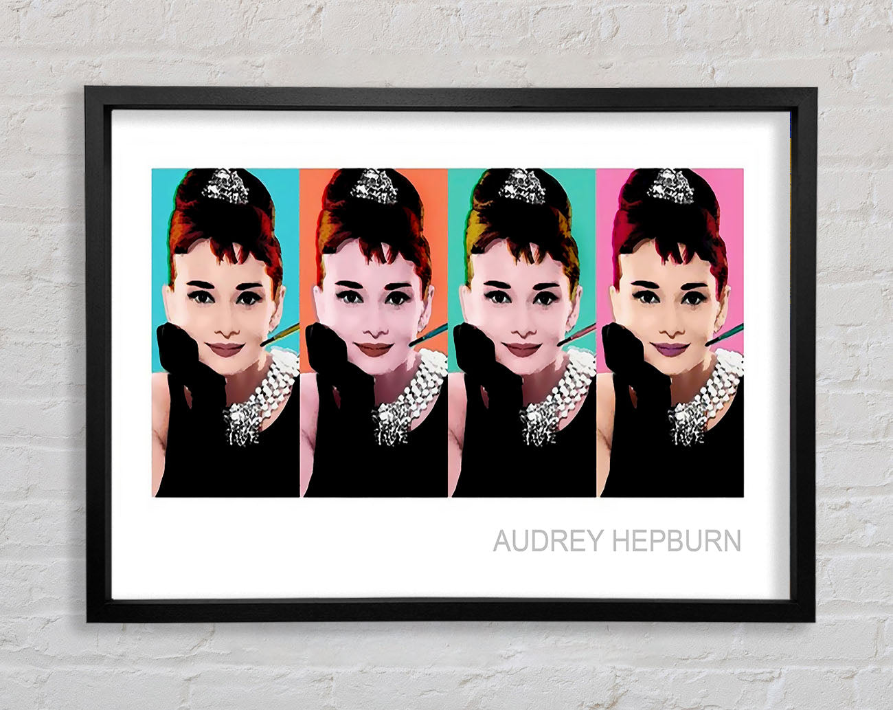 Audrey Hepburn 4 Faces Framed Print