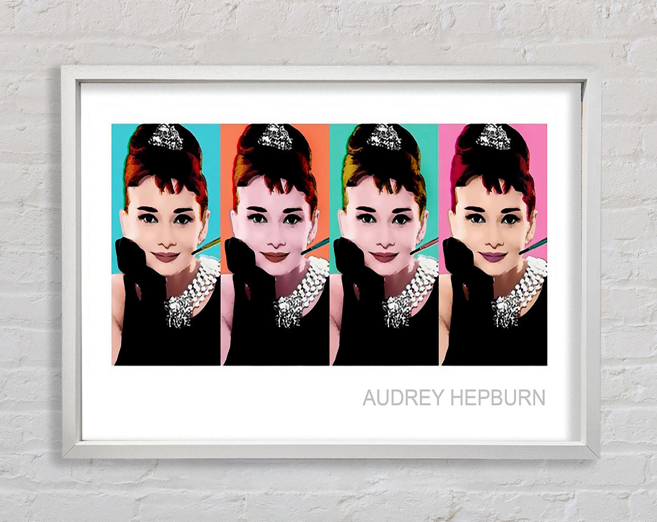 Audrey Hepburn 4 Faces Framed Print