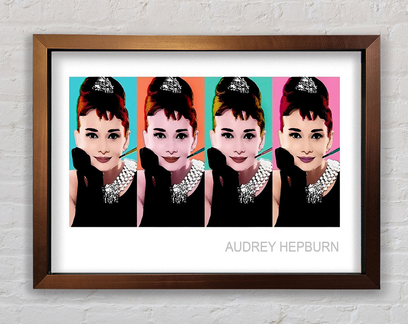 Audrey Hepburn 4 Faces Framed Print