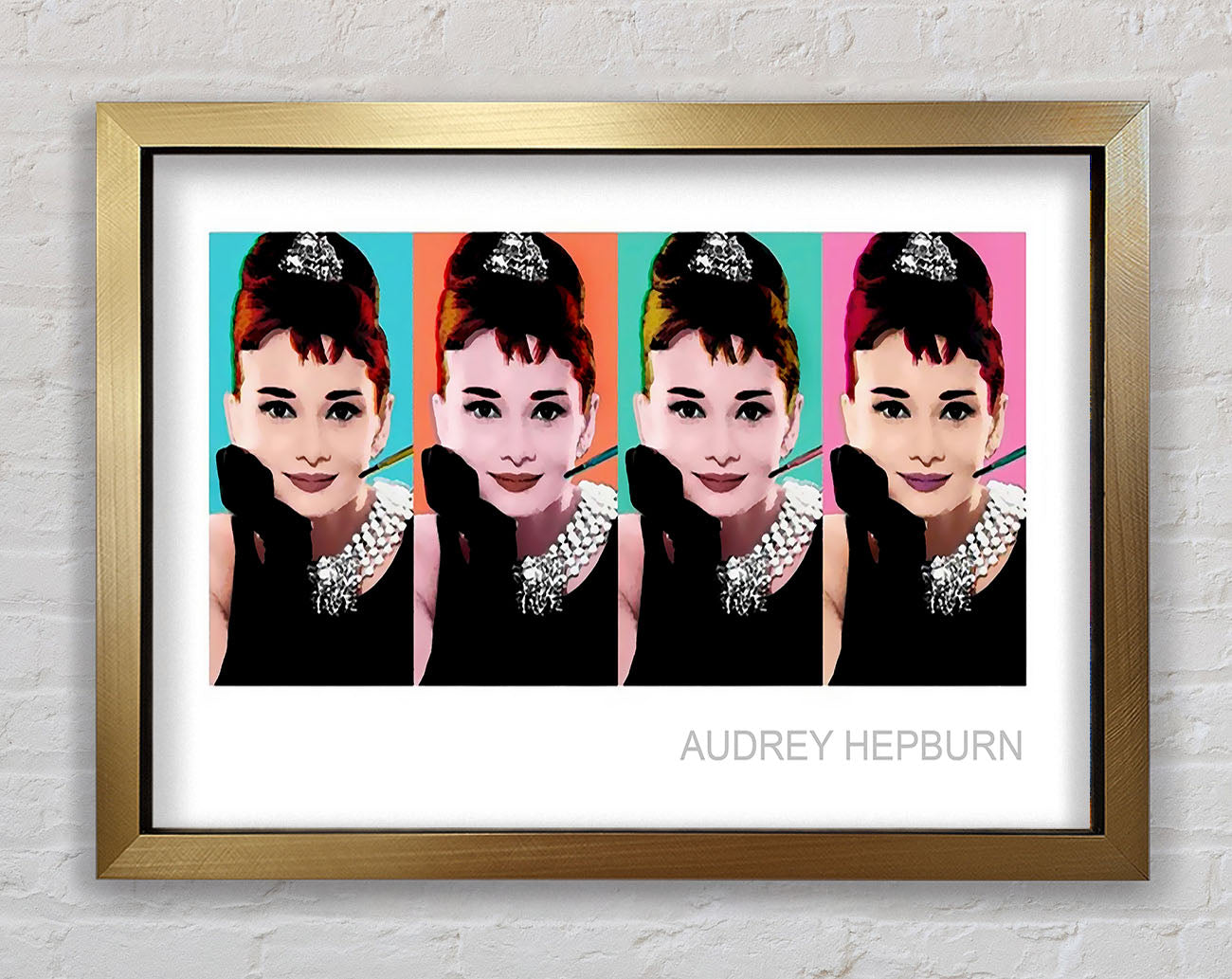 Audrey Hepburn 4 Faces Framed Print
