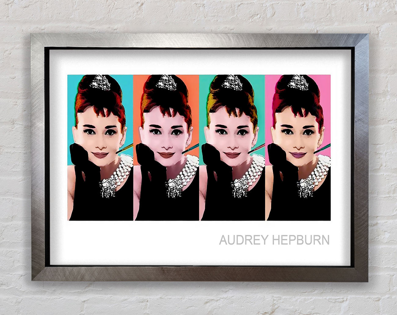 Audrey Hepburn 4 Faces Framed Print
