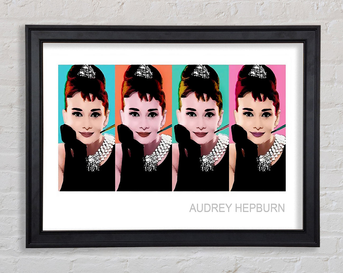 Audrey Hepburn 4 Faces Framed Print