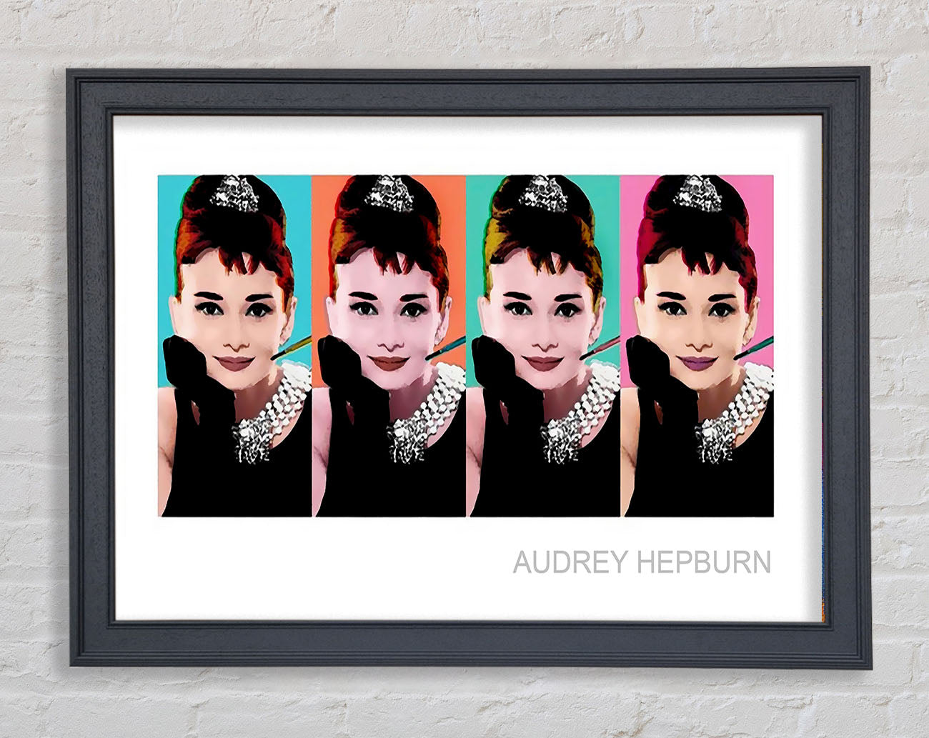Audrey Hepburn 4 Faces Framed Print