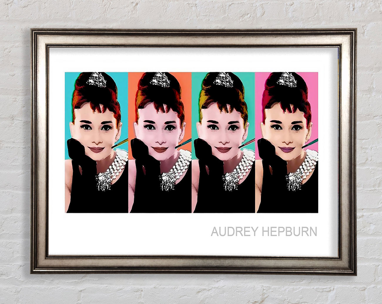 Audrey Hepburn 4 Faces Framed Print