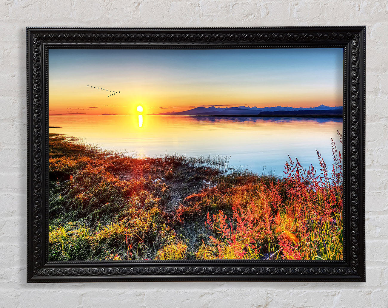 Migratory Birds Flying Over The Mountain Lake Framed Print
