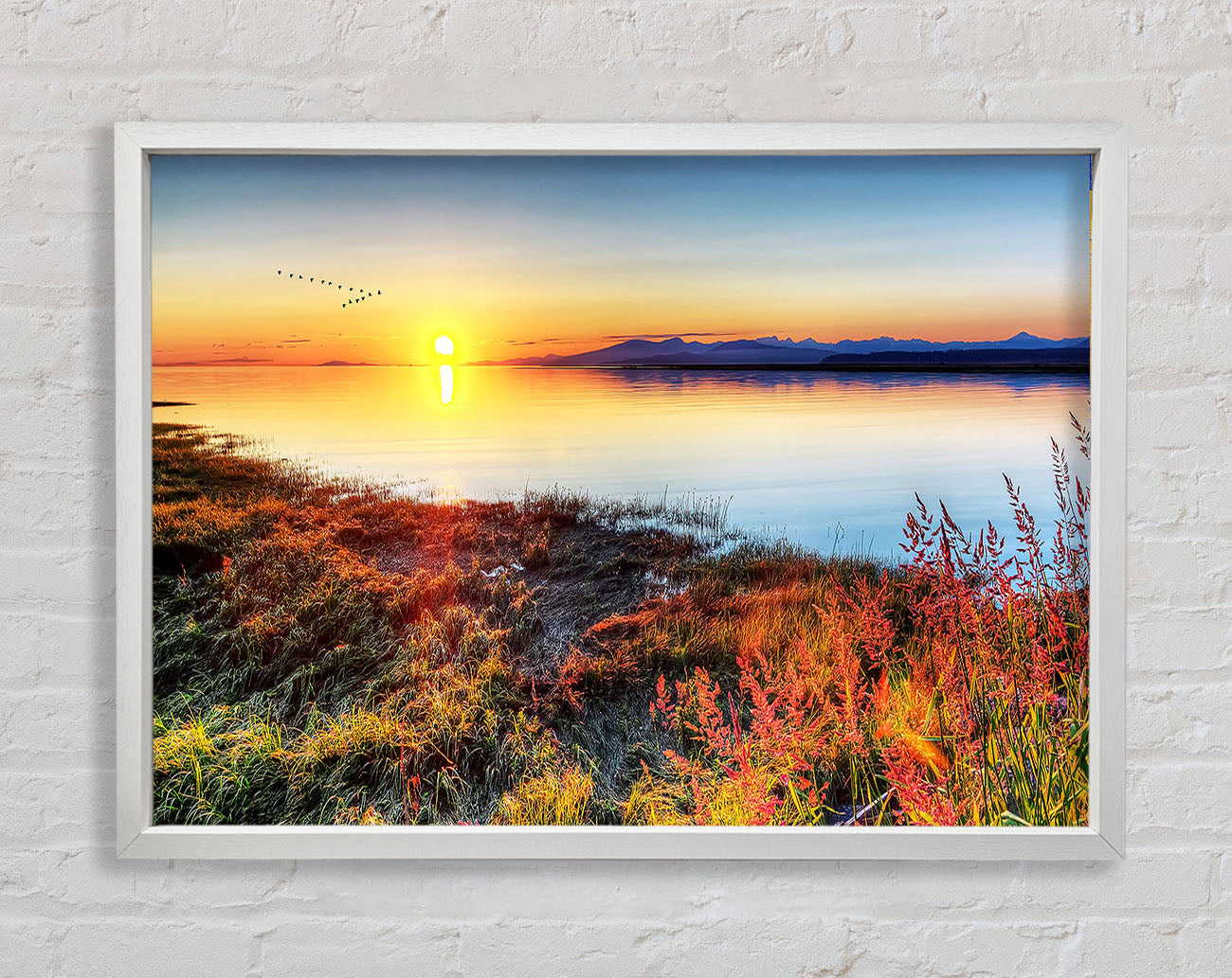 Migratory Birds Flying Over The Mountain Lake Framed Print