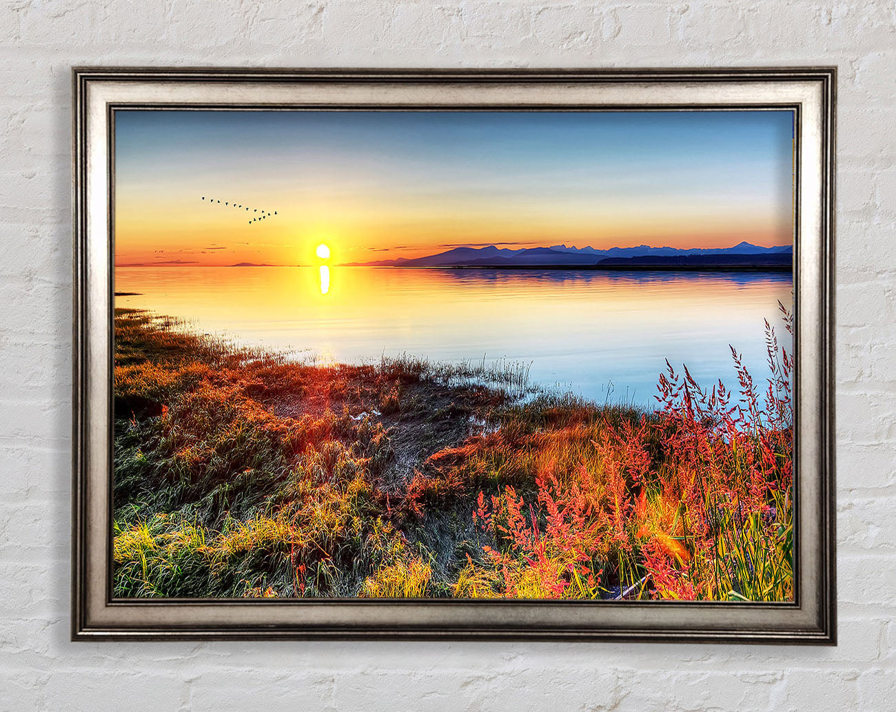 Migratory Birds Flying Over The Mountain Lake Framed Print