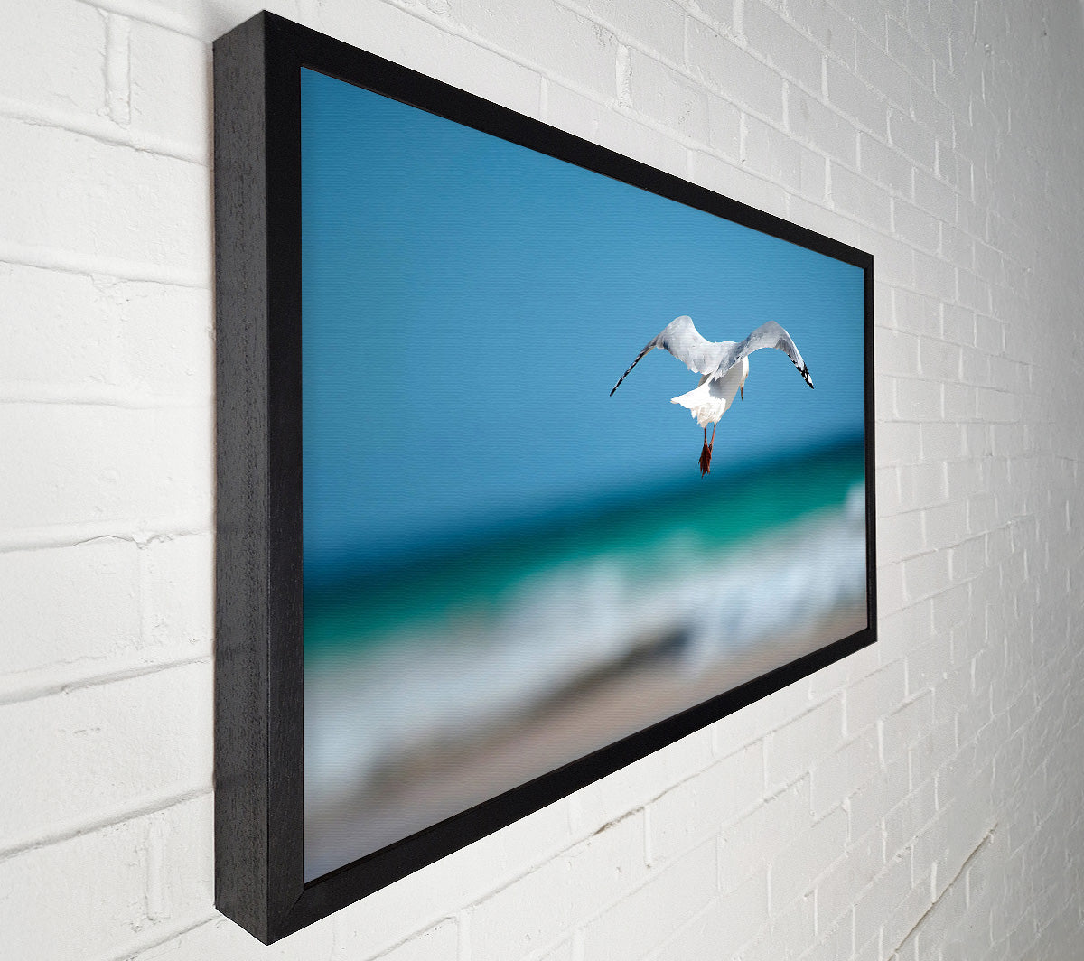 Seagull Over The Ocean Canvas Wall Art