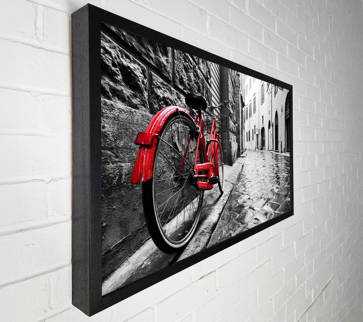 Red Bicycle In The Cobbled Streets Canvas Wall Art