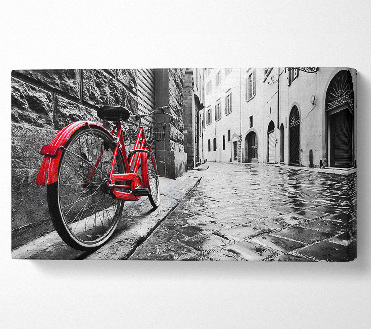 Red Bicycle In The Cobbled Streets Canvas Wall Art