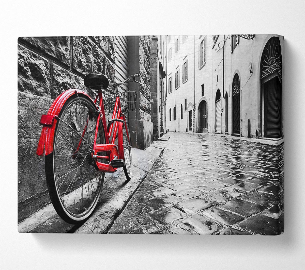 Red Bicycle In The Cobbled Streets Canvas Wall Art