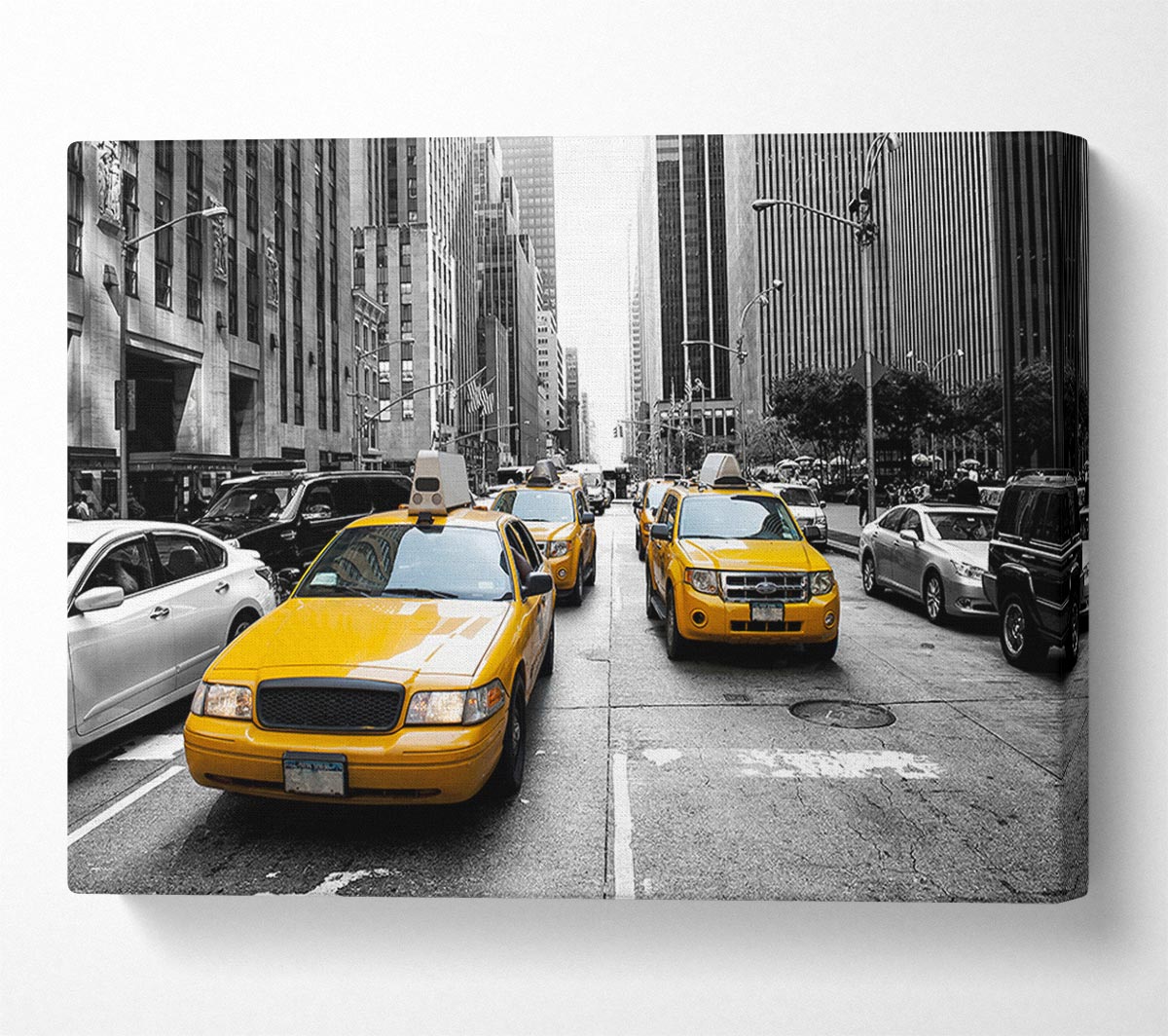 Yellow Cabs On The Inner City Steets Canvas Wall Art
