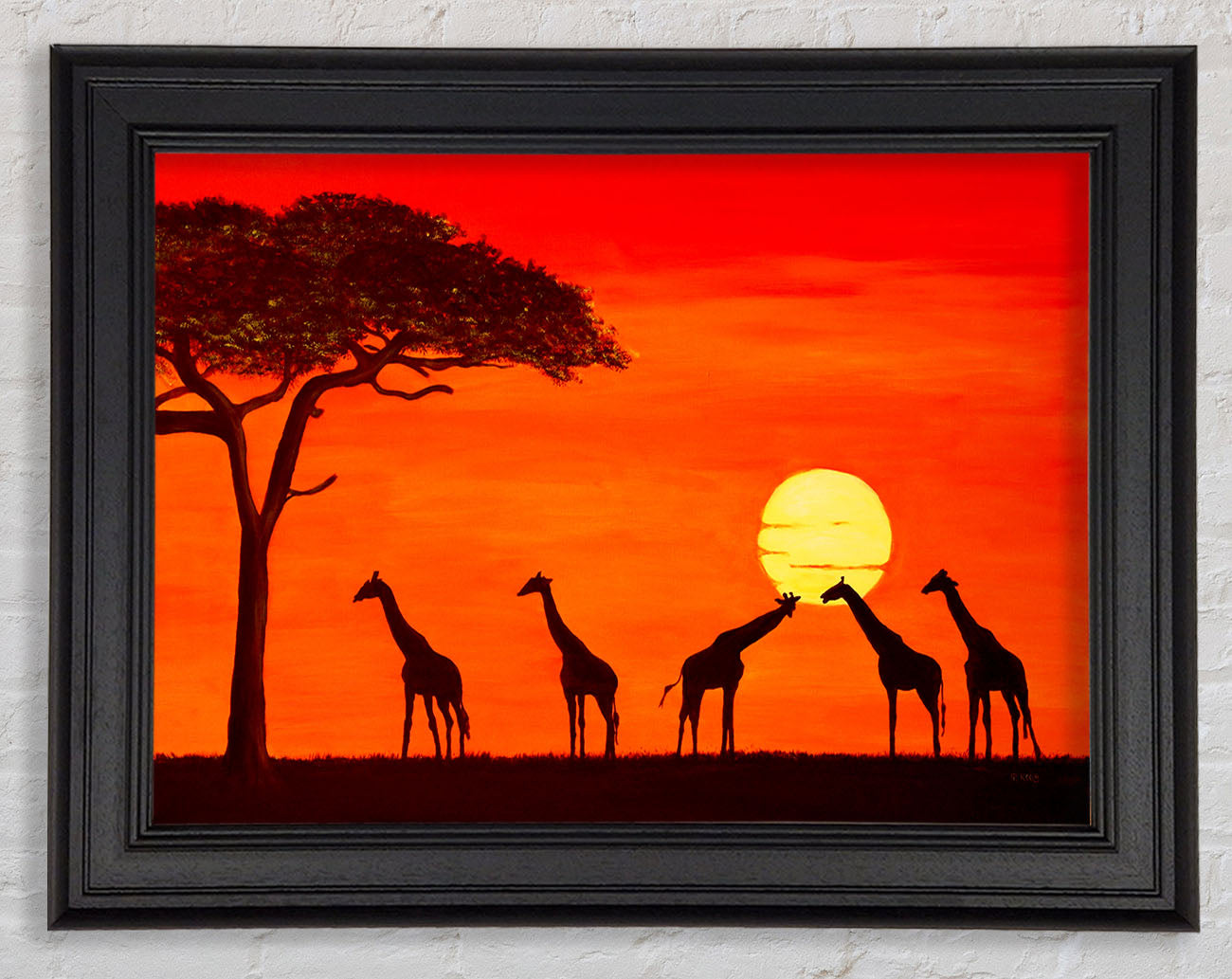 Giraffes At The Sunset Framed Print