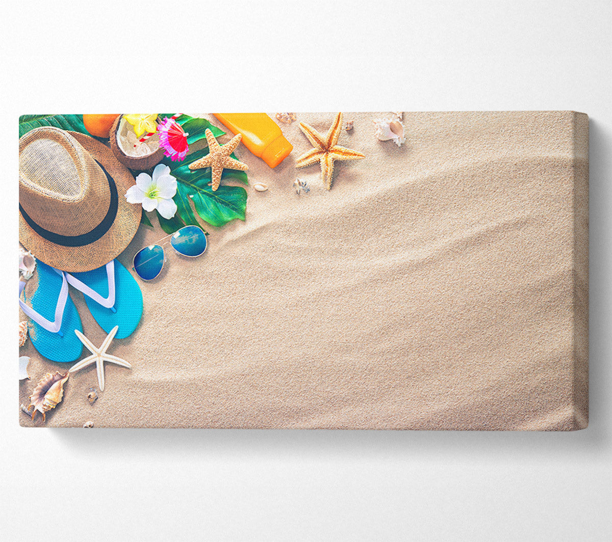 Sunglasses and hat on the beach Canvas Wall Art