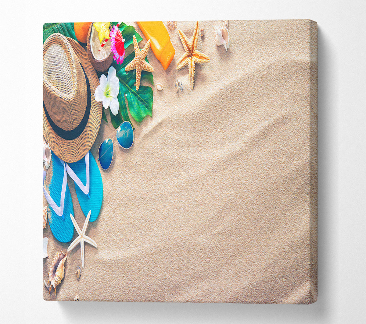 Sunglasses and hat on the beach Canvas Wall Art