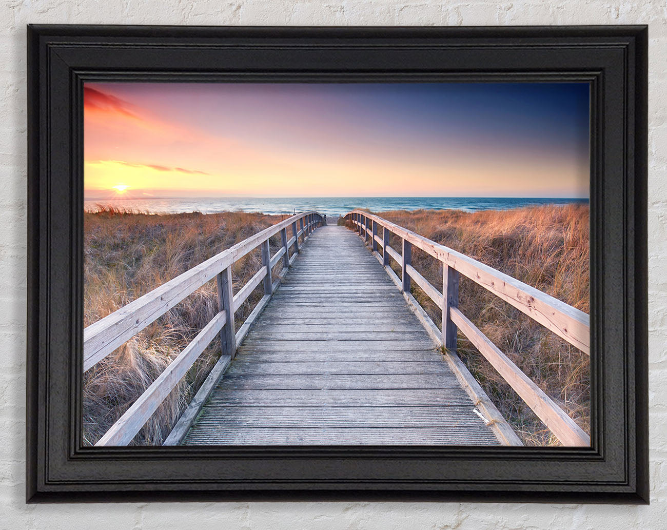 Brige to the coast Framed Print