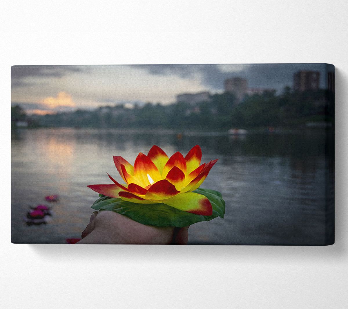 Flower candle in city view Canvas Print