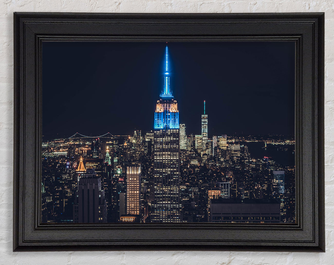 Lighting up the building Framed Print