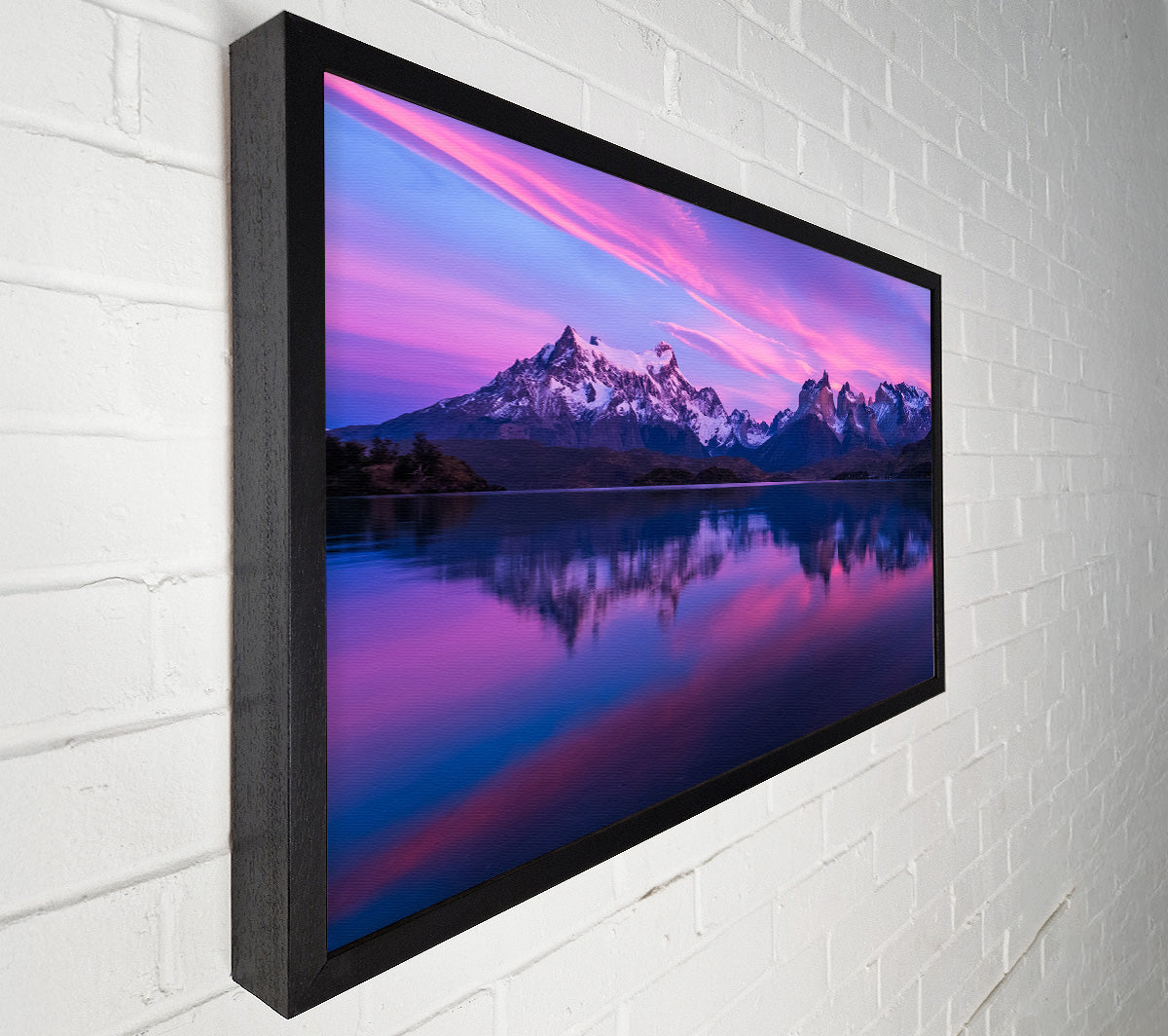 Purple and blue mountains above lake Canvas Wall Art