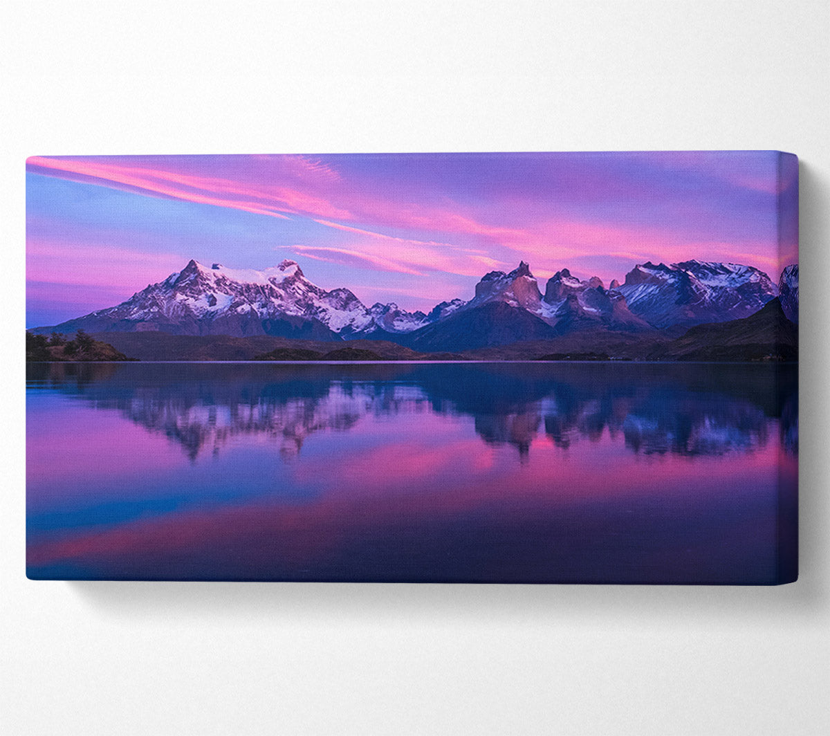 Purple and blue mountains above lake Canvas Wall Art