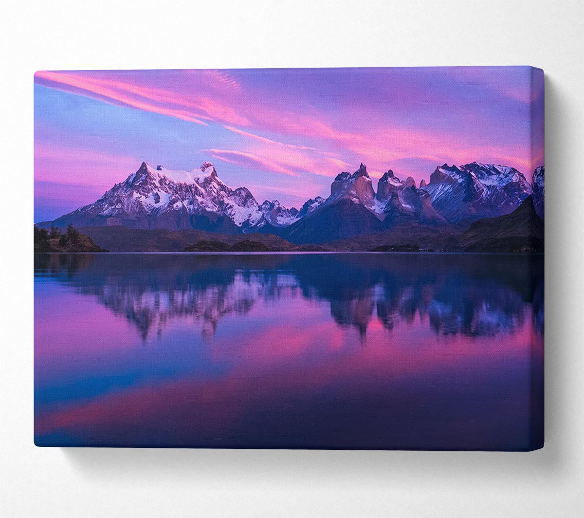 Purple and blue mountains above lake Canvas Wall Art