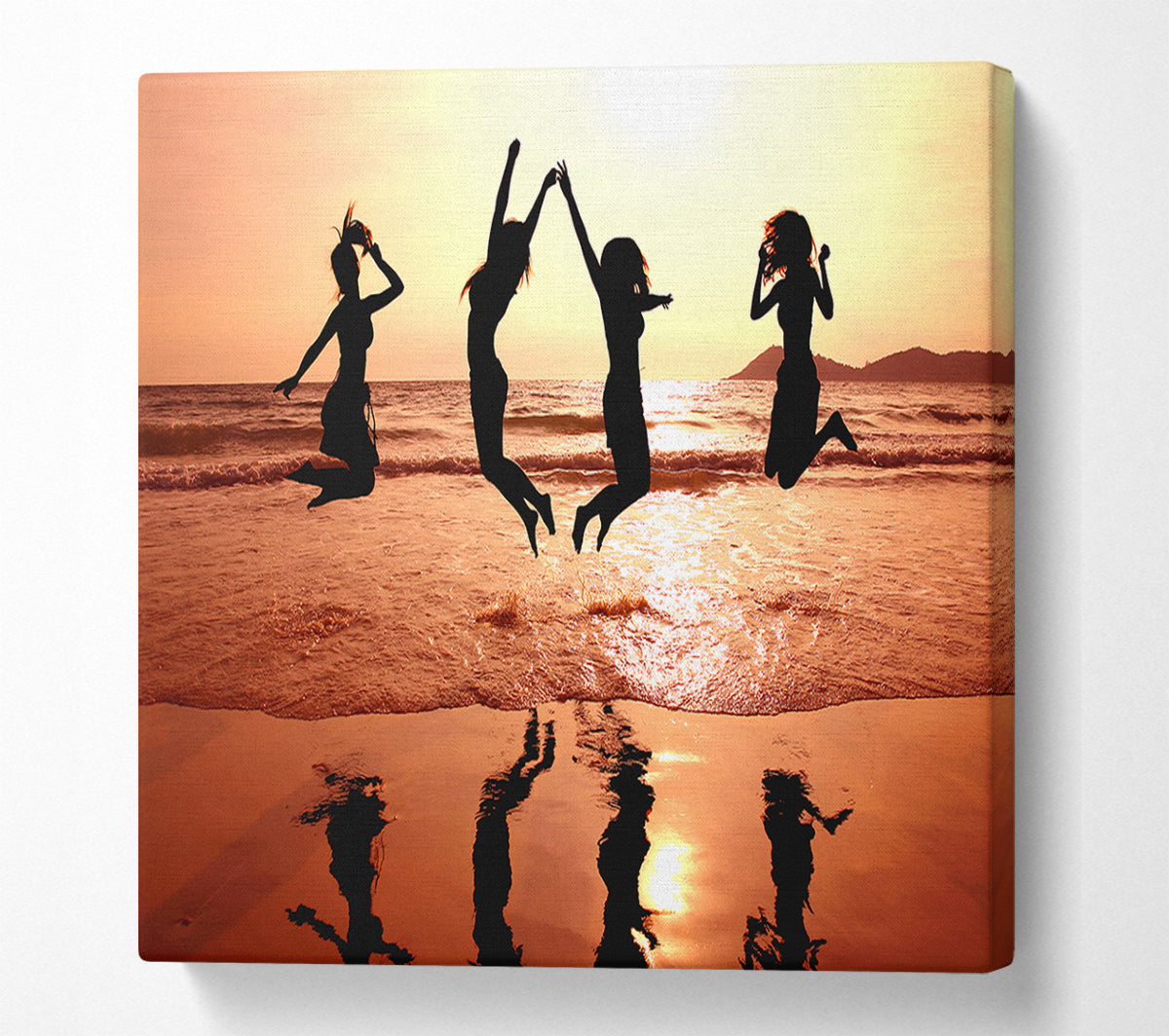 People jumping on the beach Canvas Print