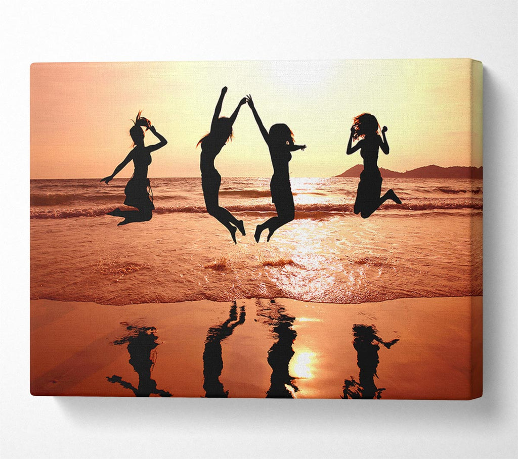 People jumping on the beach Canvas Print