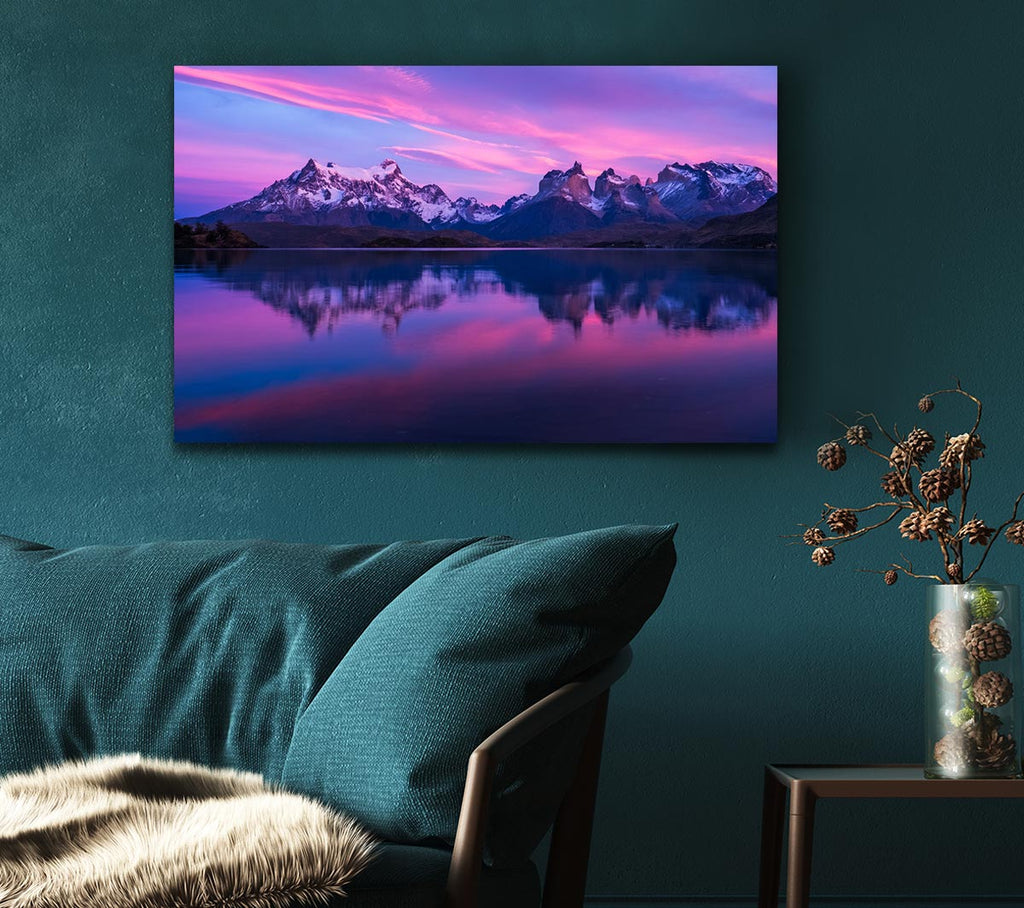 Purple and blue mountains above lake Canvas Wall Art