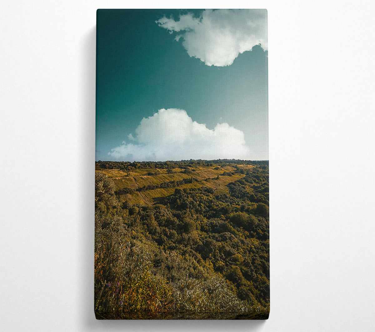 Teal Clouds Over Hills Canvas Wall Art