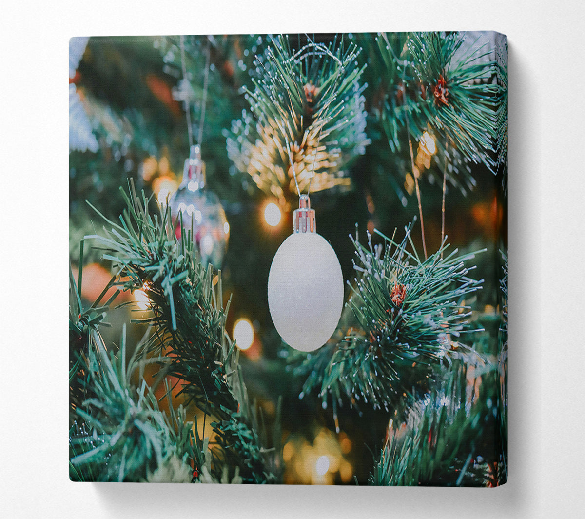 White Ornament On Green Tree Canvas Wall Art